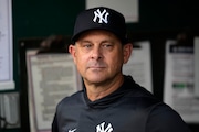 Yankees manager Aaron Boone looks on during a baseball game against the Kansas City Royals, Tuesday, June 10, 2025, in Kansas City, Mo. (AP Photo/Ed Zurga)