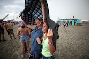 People evacuate the Barefoot Country Music Fest venue on the beach in Wildwood because of the threat of strong thunderstorms, Friday, June 17, 2022. The same, an evacuation due to inclement weather, happened on the first day of the event June 19, 2025.