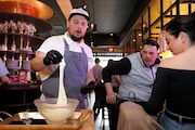 Sous Chef , Christopher Pietrowicz prepares to serve freshly made mozzarella to cutsomers at Bar Mutz an Italian restaurant in Westwood, New Jersey on Wednesday, March 19, 2025.