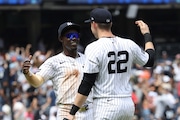 New York Yankees' Jazz Chisholm Jr., left, and Ben Rice, right, react after defeating the Baltimore Orioles in a baseball game Sunday, June 22, 2025, in New York. (AP Photo/Pamela Smith)