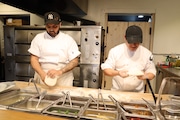 TKTKTK and TKTKTK making pizza at One World Pizza in Jersey City, NJ (Lauren Musni|NJ Advance Media)