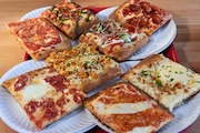 A variety of pizza slices at Corner Slice pizzeria in Maplewood on Friday, Feb. 7, 2025.