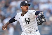 Marcus Stroman pitched a scoreless first inning, allowing two hits, Friday in the Yankees' Grapefruit League opener in Tampa against the Tampa Bay Rays.