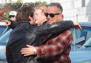 Jeremy Allen White and Bruce Springsteen embracing on the Bayonne set of "Deliver Me from Nowhere" in November.