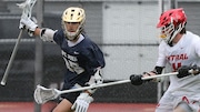 Eric Vargas (25) of Pope John looks to get past John Flynn (14) of Hunterdon Central during the boys lacrosse Hunterdon/Warren/Sussex Tournament Final at Hunterdon Central High School on 5/7/22.